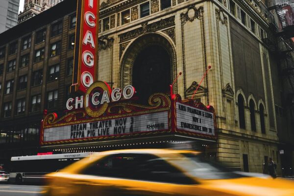 passing cars near chicago theater