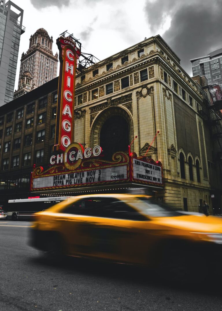 passing cars near chicago theater